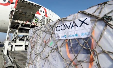 A Covax shipment of coronavirus vaccine is unloaded from a cargo plane in Ethiopia