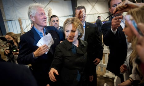 Hillary Clinton and former president Bill Clinton greet supporters in Iowa last year.