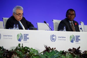 Selwin Hart, UN special adviser and assistant secretary-general for climate action and Fatih Birol, executive director of the International Energy Agency, look on during the conference.