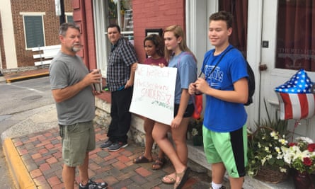 People protesting outside the Red Hen.