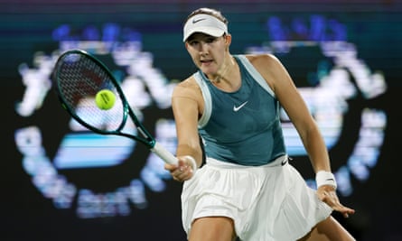 Mirra Andreeva hits a forehand in her semi-final match with Elena Rybakina.