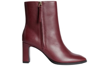 A burgundy block heel leather ankle boot on a white background
