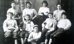 Emma Clarke, second from the left in the back row, was the first black female footballer. She is pictured here with players from Mrs Grahamâs XI in 1895.
