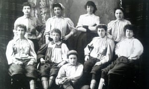 Emma Clarke, second from the left in the back row, was the first black female footballer. She is pictured here with players from Mrs Grahamâ€™s XI in 1895.