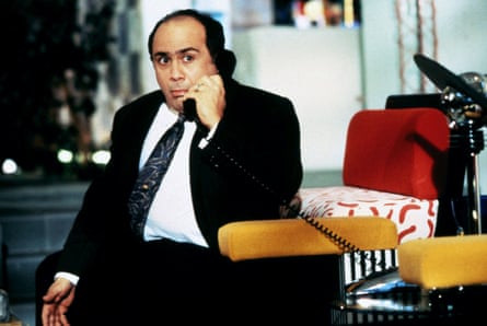 A byword for bad taste … Danny DeVito in Ruthless People; his home is kitted out with Memphis furniture.