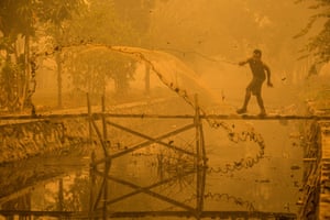 Shortlisted: Björn Vaughn. Slamet is a builder in Palangka Raya, Central Kalimantan, Indonesia. All construction work has stopped due rampant peat fires blanketing the region in a toxic smog. He casts his net into a polluted canal, hoping to make a catch. “Better a dirt fish than no fish at all!” he says.
