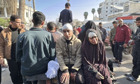 Grieving relatives accompany the bodies of Palestinians who were killed in the Israeli strike in central Gaza are at the Al-Ahli Baptist Hospital morgue in Beit Lahia, Gaza.