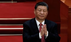 Chinese President Xi Jinping applauds at the closing session of the National People's Congress (NPC) at the Great Hall of the People in Beijing, China March 11, 2024