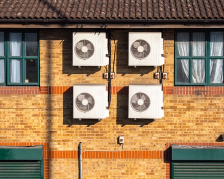 Air conditioning units on the side of a building.