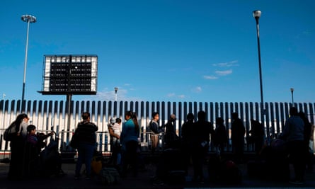 Asylum seekers wait for their turn to cross to the United States at El Chaparral crossing port on the US-Mexico border in Tijuana, Baja California state, Mexico, on 29 February 2020. In 2018, when a district judge in the ninth circuit blocked Trump restrictions on asylum applications, Trump tweet-raged that “the 9th Circuit is a complete &amp; total disaster” and “out of control” with “a horrible reputation.”