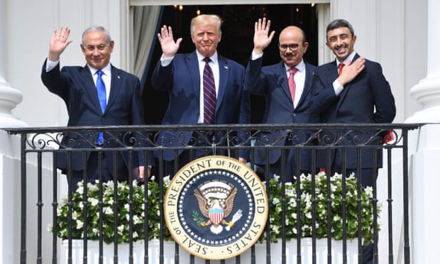 Benjamin Netanyahu, Donald Trump, Bahrain foreign minister Abdullatif al-Zayani and UAE foreign minister Abdullah bin Zayed Al-Nahyan wave from the Truman Balcony at the White House.
