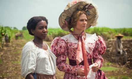 A scene from the 2018 TV adaptation of The Long Song, with Tamara Lawrance, left, as July and Hayley Atwell as Caroline.