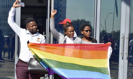 Activists celebrate outside the high court in Gaborone, Botswana, on Tuesday.