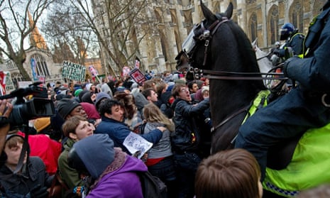 Mounted police confront protesters during student demonstrations in London, on 9 December, 2010.
