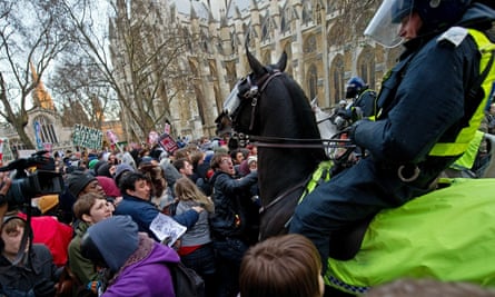 Mounted police drive their horses into protesters during student demonstrations in London in December 2010.