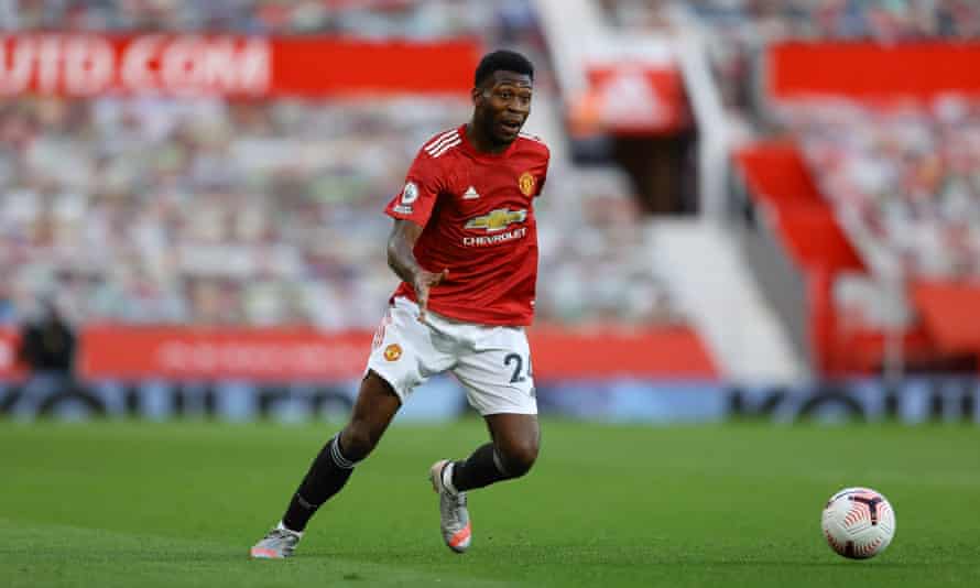 Timothy Fosu-Mensah playing for Manchester United at Old Trafford.