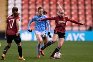 Manchester United and Manchester City in action in the WSL last month. Kelly Simmons pays tribute to the work done by clubs.