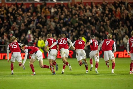 Fleetwood players celebrate winning the penalty shootout.