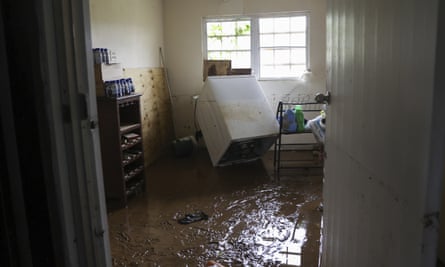 Mud covers the floor of a home flooded by Hurricane Fiona in Cayey, Puerto Rico.