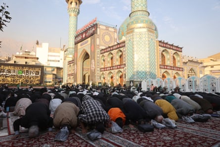 People praying for rain at the Imamzadeh Saleh shrine in Tehran