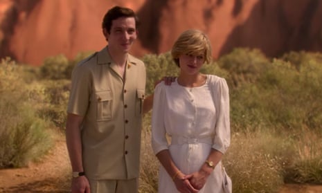 Josh O’Connor as Prince Charles and Emma Corrin as Princess Diana in front of Uluru.