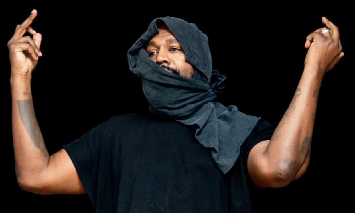 Kanye West wears Ku Klux Klan-style hood at album listening event (theguardian.com)