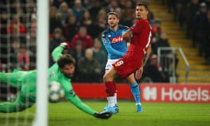 Dries Mertens of Napoli makes it 1-0 at Anfield, driving his shot past Alisson.
