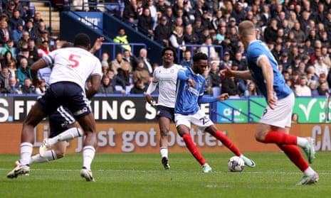 Portsmouth's Abu Kamara scores his sides first goal of the game during the Sky Bet League One match at Bolton.