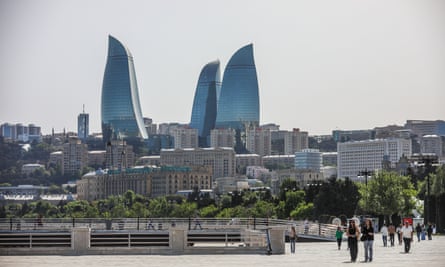 Flame Tower is seen in the background, in Baku.