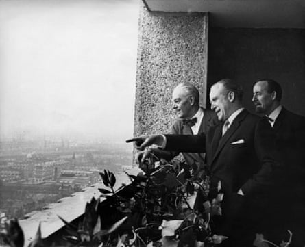 Erno Goldfinger, left, admires the view from Balfron Tower in Poplar, east London, with then Greater London Council leader Desmond Plummer, centre, and housing chairman Horace Cutler in 1968.