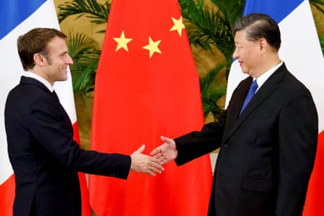 French President Emmanuel Macron meets with Chinese President Xi Jinping.