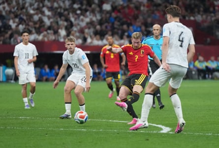 Kevin De Bruyne scores Belgium's third goal.