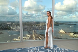 Model in slashed white dress
