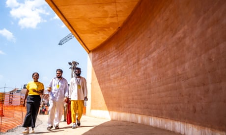 MOWAA volunteer and guests arrive at the entrance to the MOWAA Institute at the hard hat opening. November 2024 (c) MOWAA.
