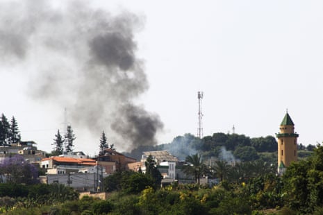 Smoke billows during Israeli bombardment over the Lebanese village of Najjariyeh on Friday, in southern Lebanon near the border with Israel.
