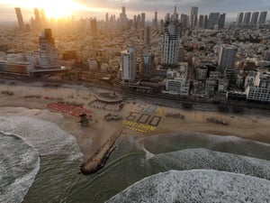 People gathered on the beach to demonstrate against the war in Gaza