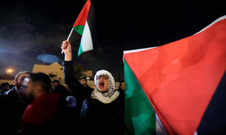 Jordanians take part in a protest in Amman in protest at Donald Trump’s Middle East peace plan.