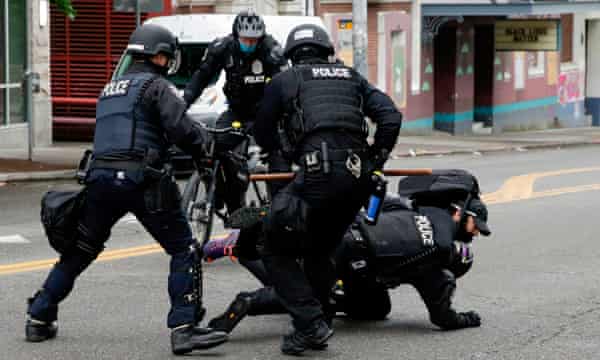 Seattle Protesters Seek Recompense For Injury And Death Linked To