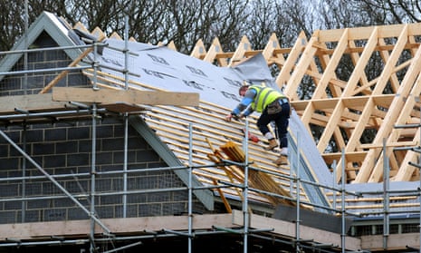 A roof worker on a new-built house.