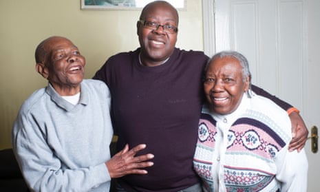 Michael Robinson with his father James, aged 100, and mother, Pearl 88, who both have Alzheimer’s and require daily care.