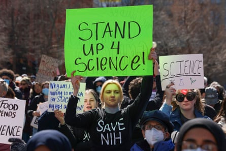 a personification holds a motion that sounds ‘stand up for science’