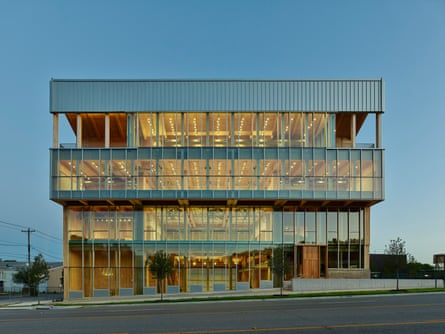 A six-storey shop window faces the highway.