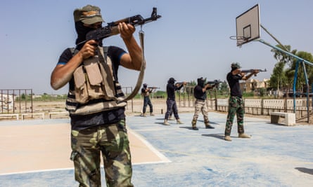 Iraqi Shia recruits in a training centre in the east of Baghdad in August 2014.