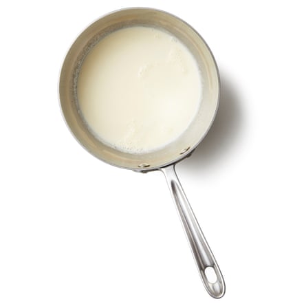 Bring the dairy to a simmer: Slowly bring the cream and milk to just below a simmer in a smallish pan, making sure it doesn’t come to the boil (note: if you can’t get hold of whipping cream, you could use double cream instead – you’ll just end up with a richer result; likewise, semi-skinned milk could substitute for whole, if need be).