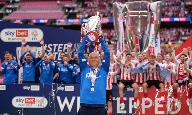 Alex Neil celebrates Sunderland’s promotion via the League One playoffs.