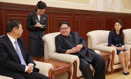 A picture released from North Korea’s official news agency earlier this week shows leader Kim Jong-un, centre, with his wife Ri Sol-ju, right, and the senior Chinese official Song Tao.