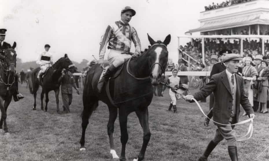 Lester Piggott on top of Never Say Die having rode the 33-1 shot to victory in the 1954 Derby. Piggott was 18 at the time