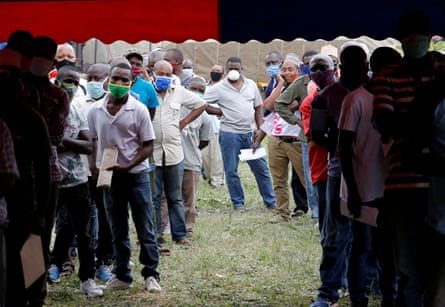 Lorry drivers queue to get tested for Covid-19 at a border crossing point between Kenya and Tanzania.