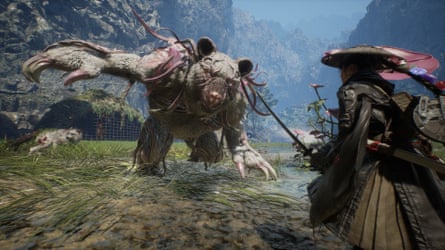 The main character stands as a large beast charges at them