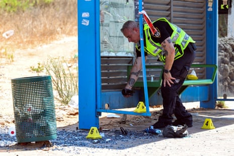 Suspected ramming attack near Kfar YonaAn Israeli police officer works at the bus station where a suspected ramming attack took place, near Kfar Yona, Israel 24 July 2025.